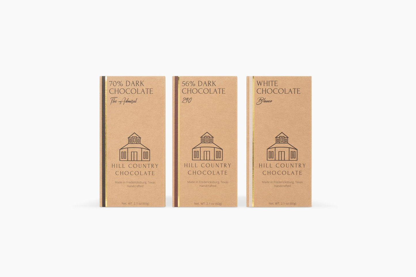 Three boxes of Hill Country Chocolate of the Month Club on a white background.