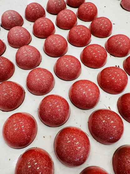 Indulge in the fiery blend of cinnamon and cayenne pepper with our Mexican Hot Chocolate artisanal bonbon collection.