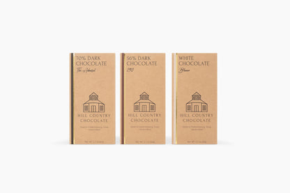 Three boxes of Hill Country Chocolate of the Month Club on a white background.