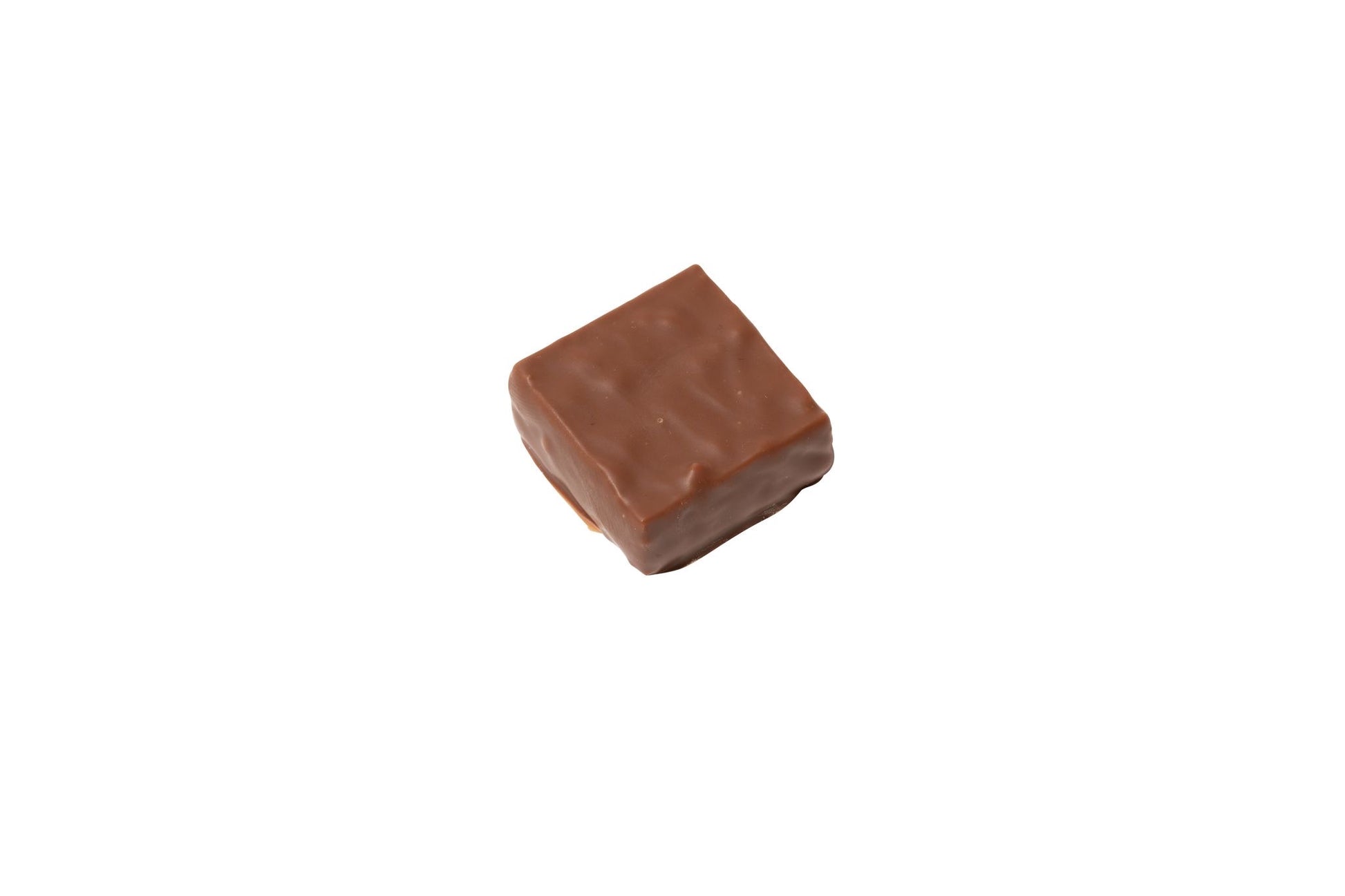 A single square piece of Hill Country Chocolate's Crunchy Hazelnut Gianduja is displayed against a plain white background.