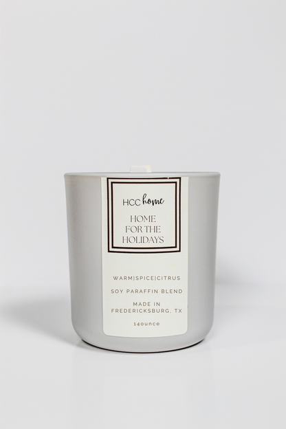 Gray HCC Home Candle - Home for the Holidays in a jar, featuring a soy paraffin blend made in Fredericksburg, TX.