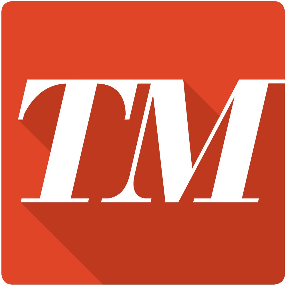 The tm logo on an orange square.