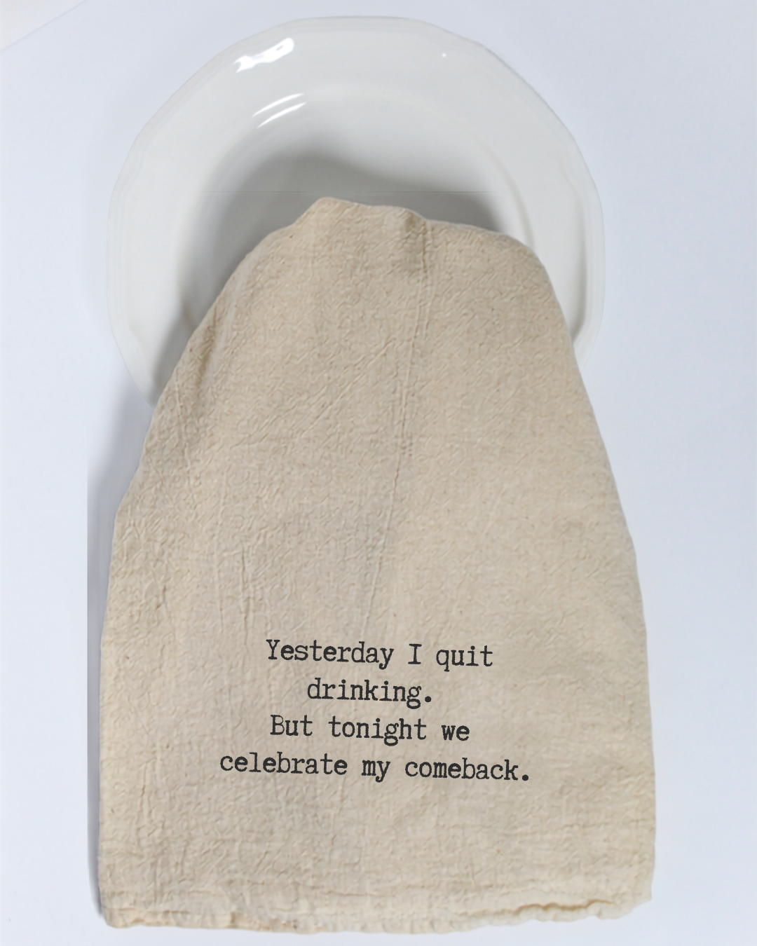 Add a playful twist to your kitchen with the “Yesterday I quit drinking...” Tea Towel from Hill Country Chocolate. Featuring the witty message, “Yesterday I quit drinking. But tonight we celebrate my comeback,” this eco-friendly cotton tea towel is perfect for adding personality—and a good laugh—to your table.