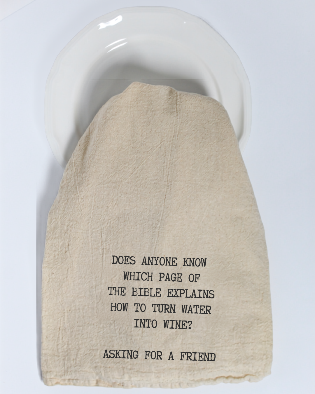 Bring a smile to any kitchen with the Hill Country Chocolate “Does anyone know which page of the Bible...” Tea Towel. This unbleached cotton tea towel features a witty message: “DOES ANYONE KNOW WHICH PAGE OF THE BIBLE EXPLAINS HOW TO TURN WATER INTO WINE? ASKING FOR A FRIEND.” It’s the perfect funny gift or décor for wine lovers and home chefs alike.