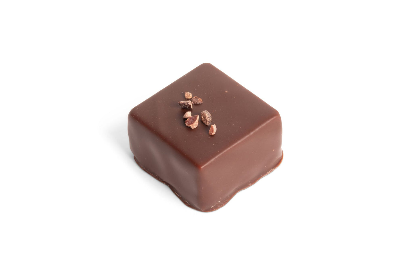 Hill Country Chocolate offers indulgent treats like Dark Chocolate Caramels topped with crunchy nuts, making for a perfect combination of rich flavors and textures.